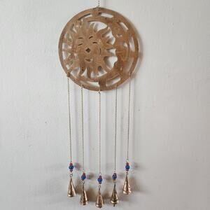 Metal sun and moon windchimes